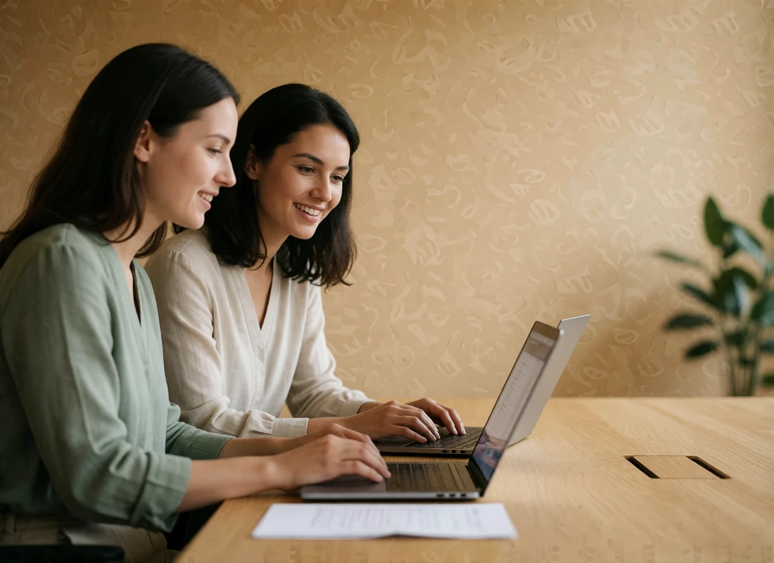 Two moderators reviewing member reports together at a light oak desk in a calm modern office